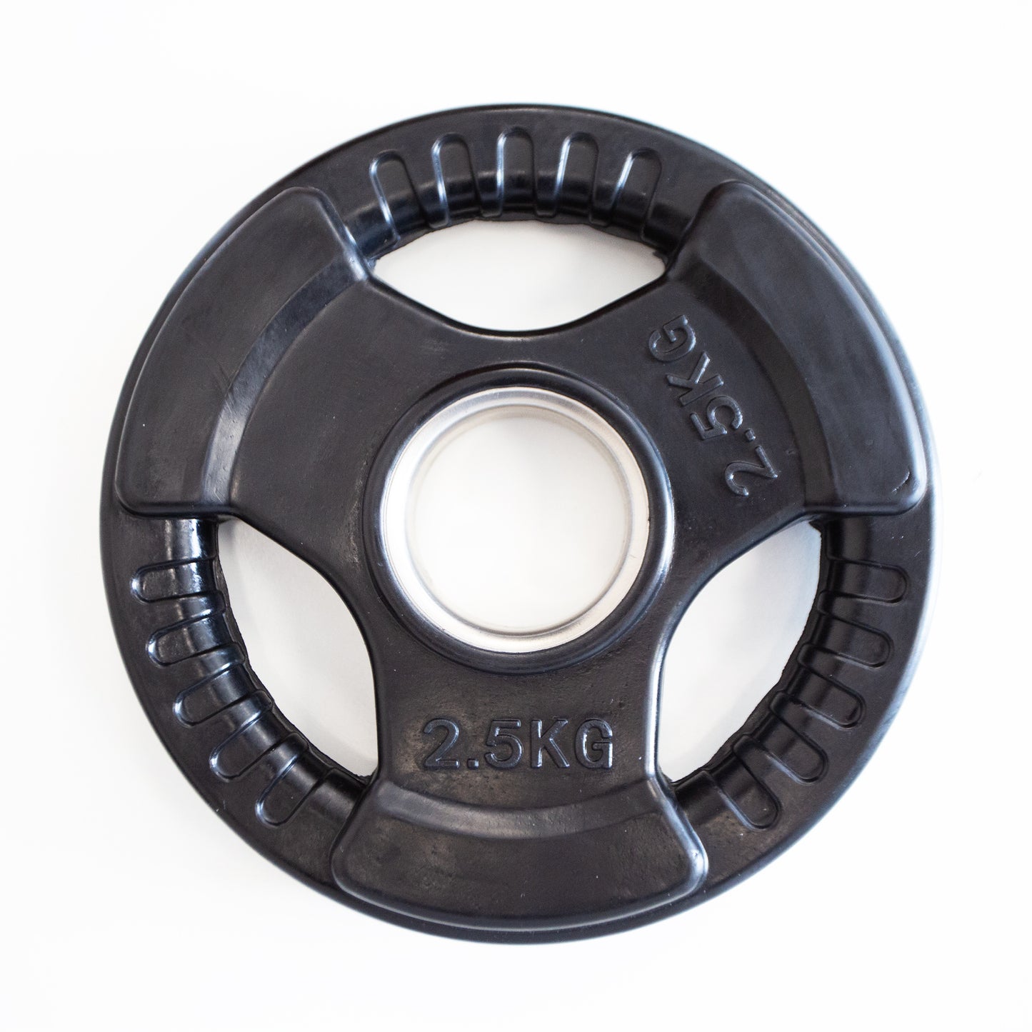 Black weight plate with '2.5KG' marking on a white background