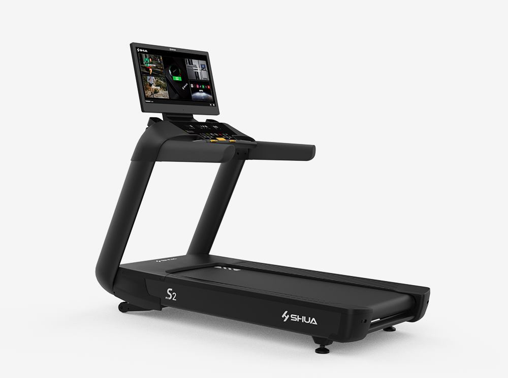 Black treadmill with a digital display on a white background, featuring the Shua brand.