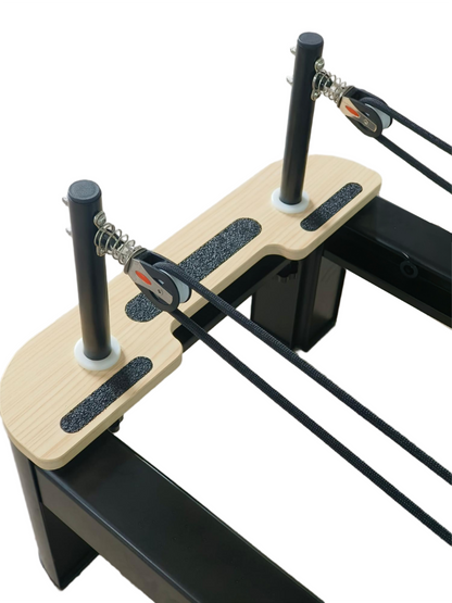 Wooden platform with metal rods and springs on a white background