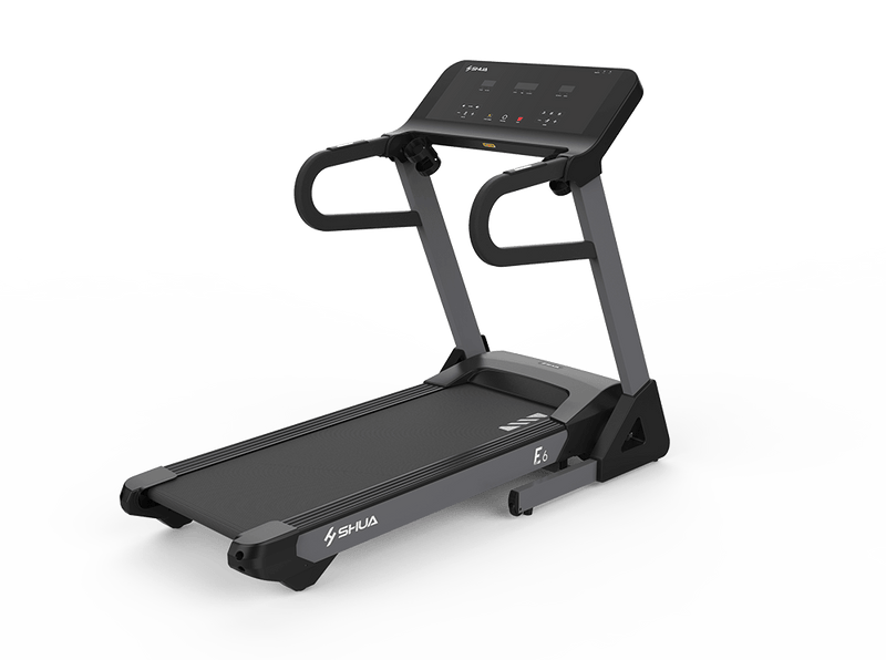 Black treadmill with digital display on a white background