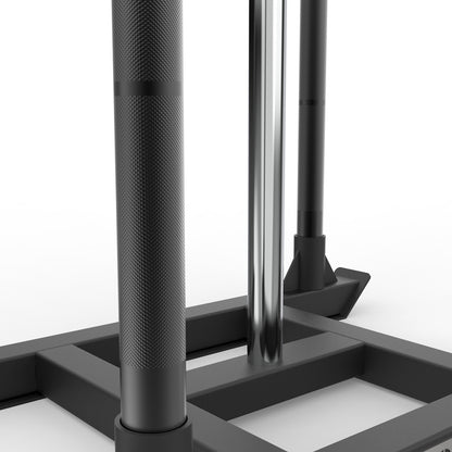 Close-up of a black metal stand with cylindrical posts on a white background