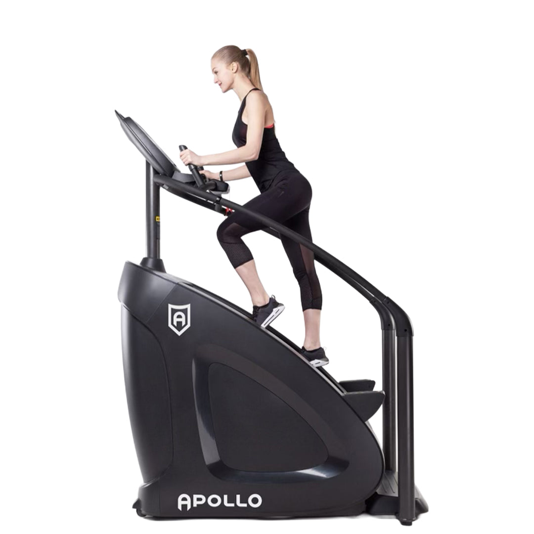 Woman exercising on an Apollo exercise bike against a white background