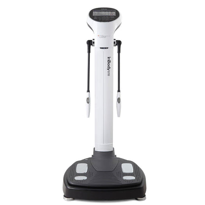 A white InBody 570 body composition analysis machine with a digital display and a gray platform.