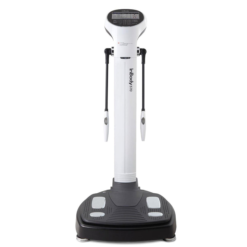 A white InBody 570 body composition analysis machine with a digital display and a gray platform.